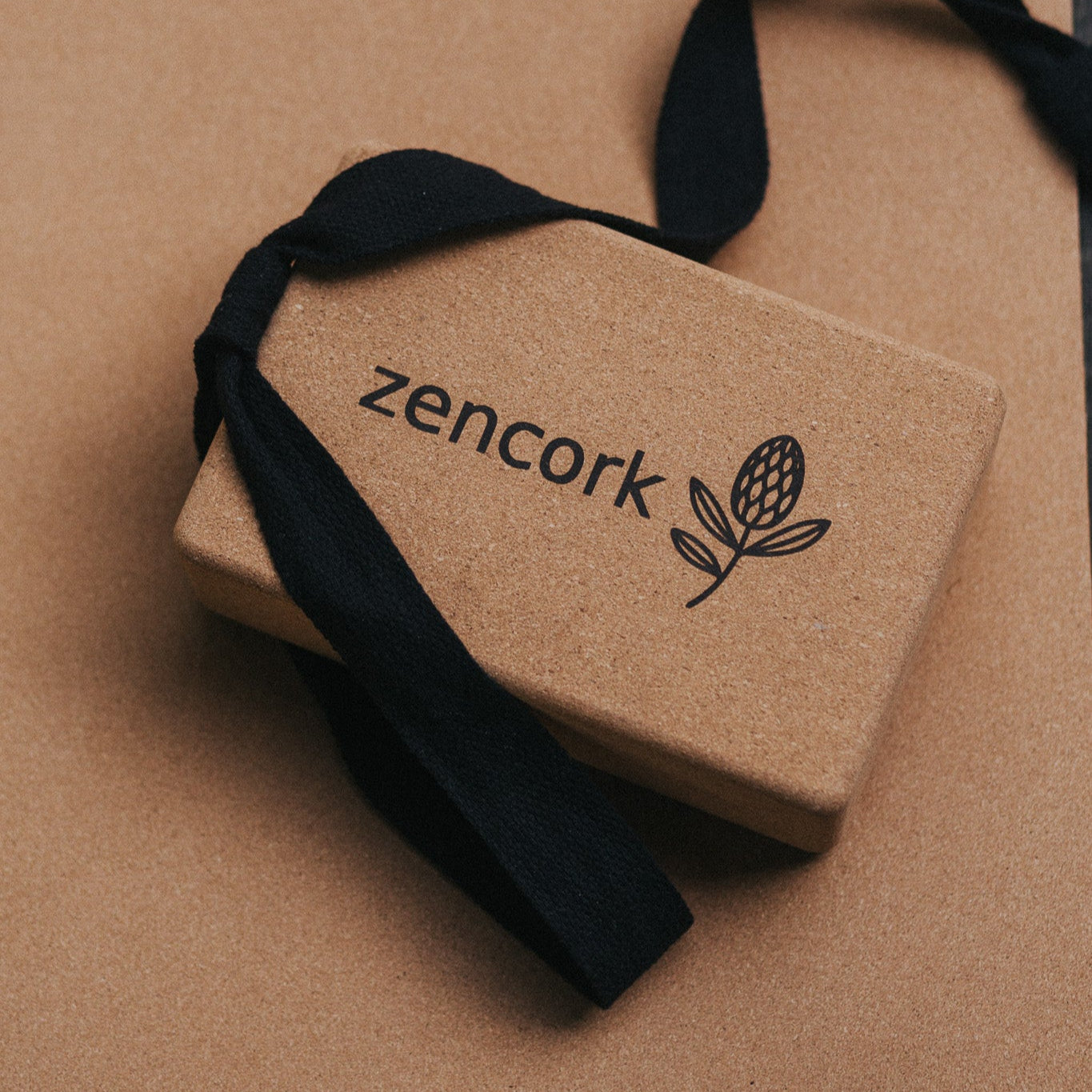 Cork product with 'zencork' branding on a cork yoga mat