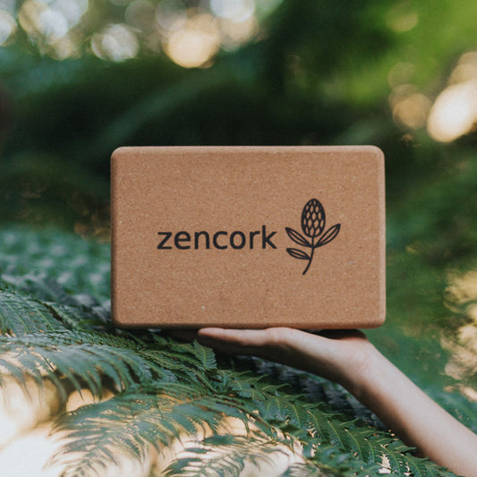 Person holding a Zencork cork product against a natural background