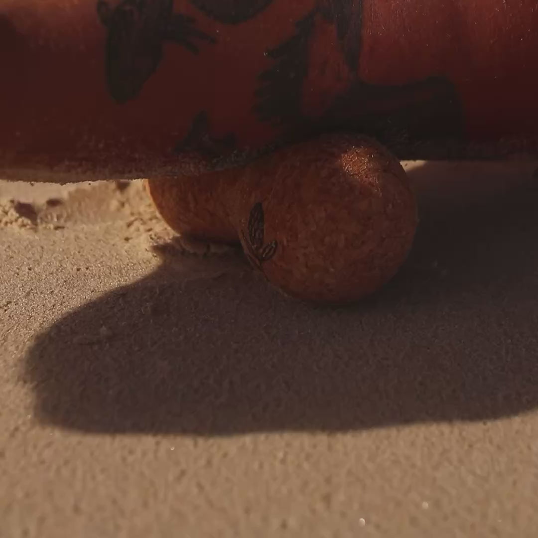 rolling out shoulder with cork massage ball - twinzer