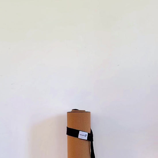 rapidly growing collection of cork yoga and recovery tools being taken away and out of screen by girl.
