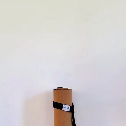 rapidly growing collection of cork yoga and recovery tools being taken away and out of screen by girl.