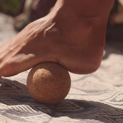 rolling foot out on single cork massage ball
